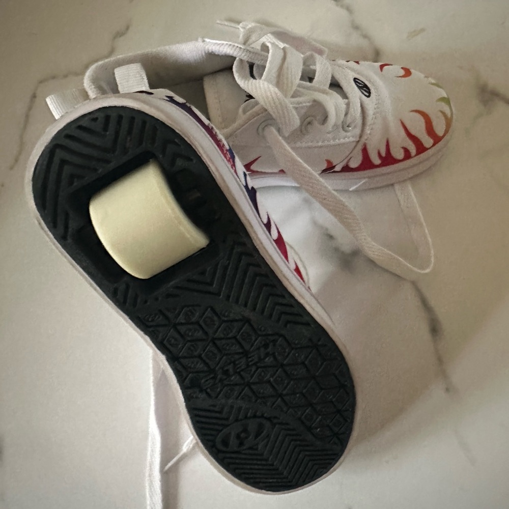 Size 13 Heelys.  NEVER worn